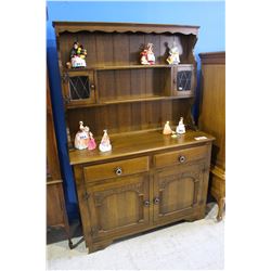 CARVED OAK STEP BACK CUPBOARD