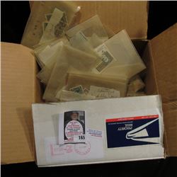 Large group of Foreign and possibly some U.S. Postage Stamps. I never had time to sort so, this barg