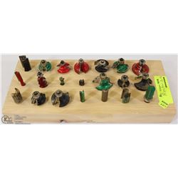 LOT WITH 21 ROUTER BITS IN WOOD HOLDER