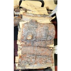 BLACK FIREWOOD RACK FULL OF FIREWOOD