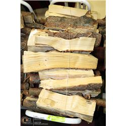 WHITE FIREWOOD RACK FULL OF FIREWOOD