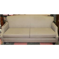 GREY FABRIC SOFA. 77"X35"