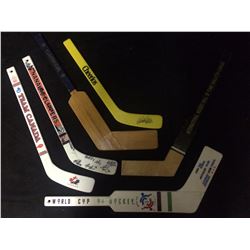 MIN HOCKEY STICKS LOT