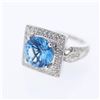 18KT White Gold 4.70ct Blue Topaz and Diamond Ring