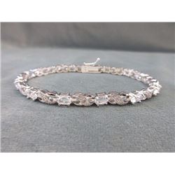 BRACELET - 3.84CTW WHITE TOPAZ & DIAMOND IN CROSS OVER DESIGNED STERLING SILVER SETTING - INCLUDES C