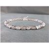 Image 1 : BRACELET - 3.84CTW WHITE TOPAZ & DIAMOND IN CROSS OVER DESIGNED STERLING SILVER SETTING - INCLUDES C
