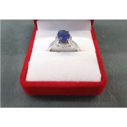 RING - 1.5CT OVAL FACETED BLUE SAPPHIRE & 2 DIAMONDS IN STERLING SILVER SETTING - RETAIL ESTIMATE $4