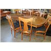 Image 1 : ANTIQUE TIGER OAK DINING TABLE WITH FOUR LEAFS AND SIX T-BACK CHAIRS