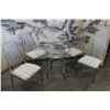 Image 2 : ROUND GLASSTOP DINING TABLE WITH FOUR CHAIRS