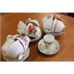 SHELF LOT OF CHINA CUPS AND SAUCERS