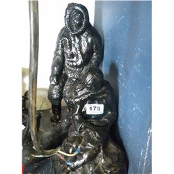 2 ESKIMO FIGURINES