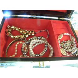 8 BRACELETS IN JEWELLERY BOX