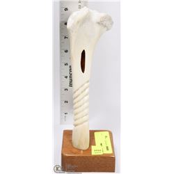 CARVED BONE ON STAND