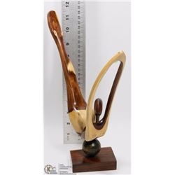 CARVED WOOD WOMAN DIVING ON STAND