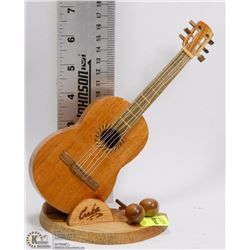 CARVED WOOD GUITAR AND MARACAS DISPLAY