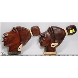 TWO CARVED MEXICAN HEADS