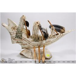 JAW BONE CARVING WITH COW HORN SHIP DISPLAY