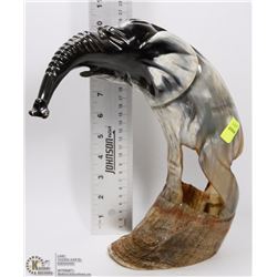 LARGE CARVED ELEPHANT OUT OF HORN