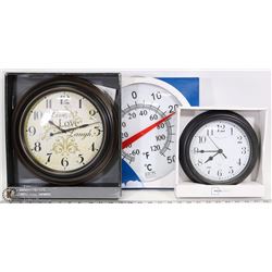 TWO WALL CLOCKS AND ONE THERMOMETER