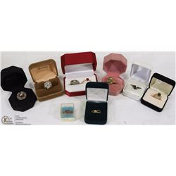 BOX OF 9 RINGS WITH BOXES SOME STAMPED STERLING