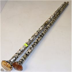 2 ENAMEL AND METAL CANES
