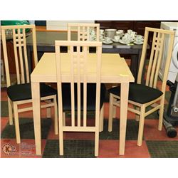 TABLE AND 4 CHAIRS, TABLE EXTENDS ON BOTH SIDES TO