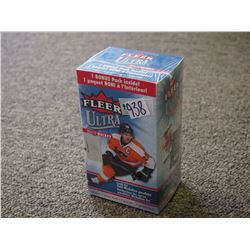 Sealed box of 2014-15 Fleer Ultra Hockey Cards; 8 Packs, look for Gold Medallion Parallel Cards!
