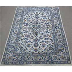 Captivating handmade Kashan rug