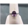 Image 1 : RING - OVAL FACETED AMETHYST & 2 DIAMONDS IN STERLING SILVER SETTING - RETAIL ESTIMATE $300