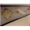 Image 1 : FLOWER PENDANT WITH GOLD TONE CHAIN