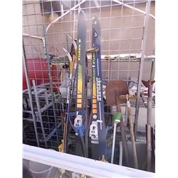 LOT OF SKI POLES & SKIES