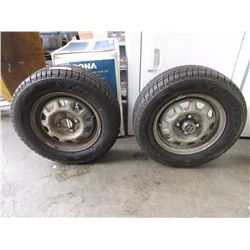 Pair of Triangle Snow Tires on Honda Rims