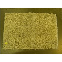 SMALL BEIGE THROW RUG