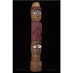 Old West Coast Totem Chief and Human