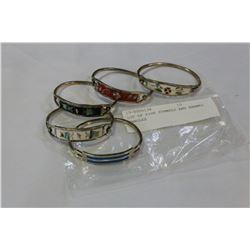 LOT OF FIVE STAMPED AND ENAMEL BANGLES