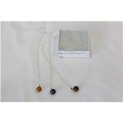 THREE STONE PENDANTS