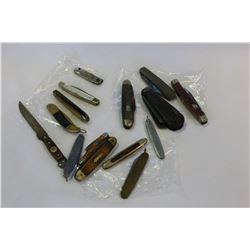 THREE SMALL BAGS OF POCKET KNIVES