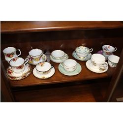 SHELF LOT OF CHINA CUPS AND SAUCERS
