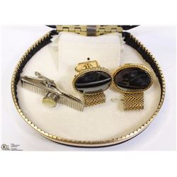 DISPLAY WITH GOLD COLORED & BLACK STONE CUFFLINKS