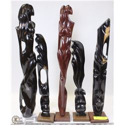 FLAT OF CARVED WOOD FIGURES ON STANDS