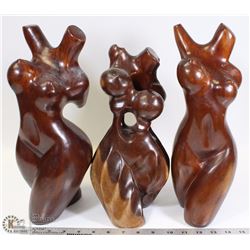 FLAT WITH 3 WOOD CARVED FEMALE TORSOES