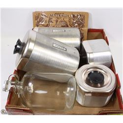 FOUR VINTAGE METAL CANISTERS