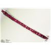 Image 1 : STERLING SILVER RUBY CHANNEL SET BANGLE
