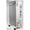 Image 1 : 2 SETTING OIL HEATER ON WHEELS 1500 W RADIANT HEAT