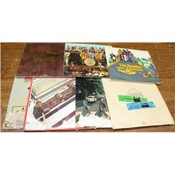 LOT OF 7 BEATLES ALBUMS - SOME WATER DAMAGE TO