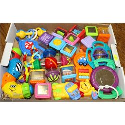 FLAT OF BABY RATTLES AND ASSORTED TOYS