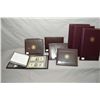 Image 1 : Selection of World Reserve Monetary Exchange "Genuine Bankers Vault Portfolios" including three foli