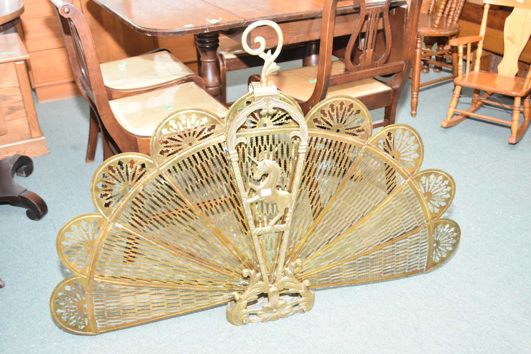 Vintage brass unicorn motif peacock style fire screen