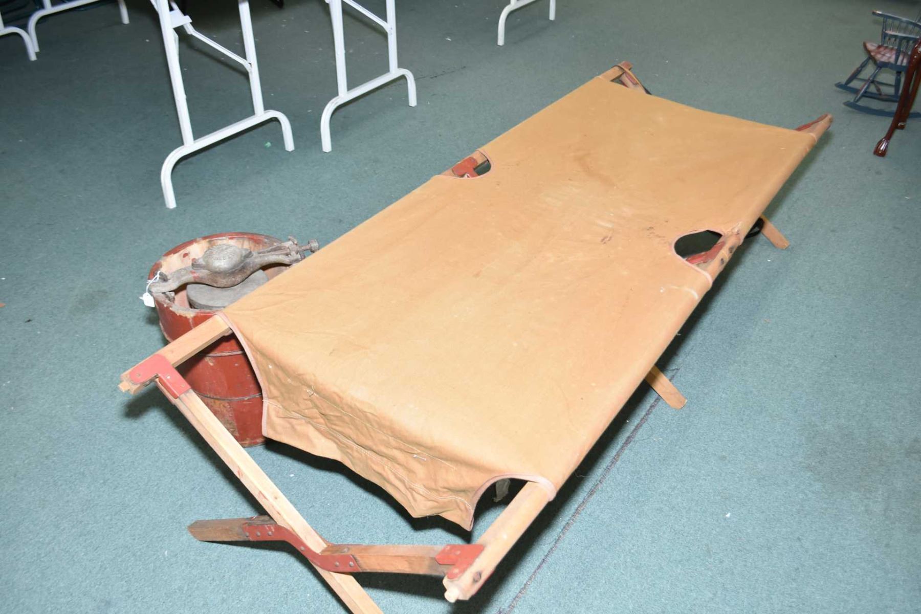 Vintage Peerless icecream maker and a vintage folding army cot