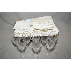 Selection of vintage linens including cut work table cloth and napkins, damask tablecloths and napki